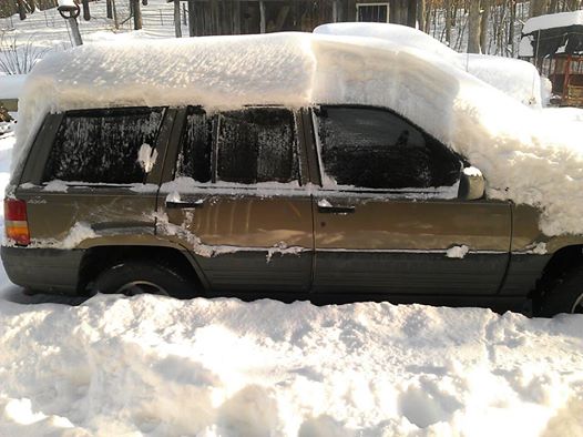 Digging Out! See, there actually was a jeep under that huge mound of snow!
