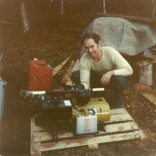 Sam looks pretty happy with his new generator. Used for recharging our radio battery! 