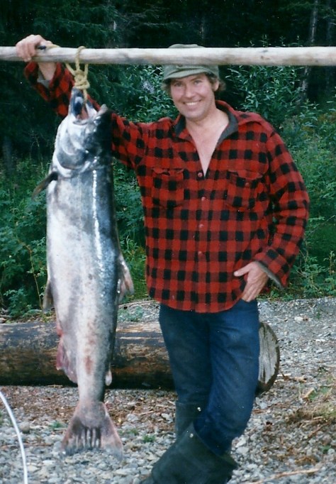 Several species of salmon enter the lake. Sam is posing with a nice King salmon. He got this one on the Kenai River, which flows through Skilak.
